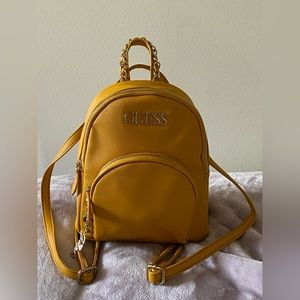 Guess mini yellow backpack silver detailing with little guess charm